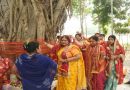 Women tie threads